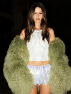 Women's cozy fluffy faux fur jacket in soft material, featuring a relaxed fit and stylishly oversized collar for warmth.