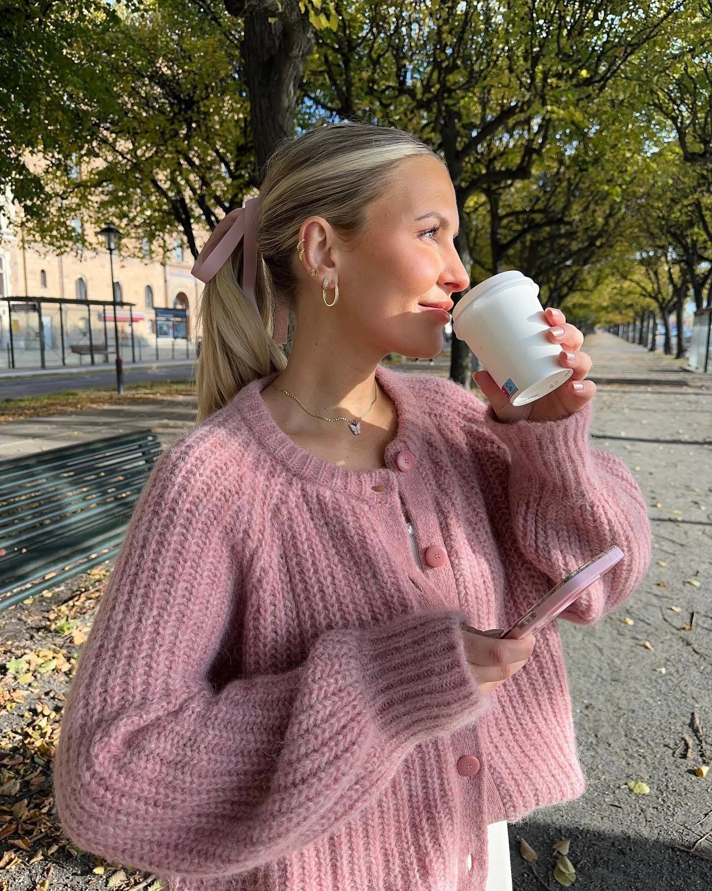 Women's cozy knit cardigan with button front, crafted from soft fabric for warmth and comfort in a relaxed fit design.