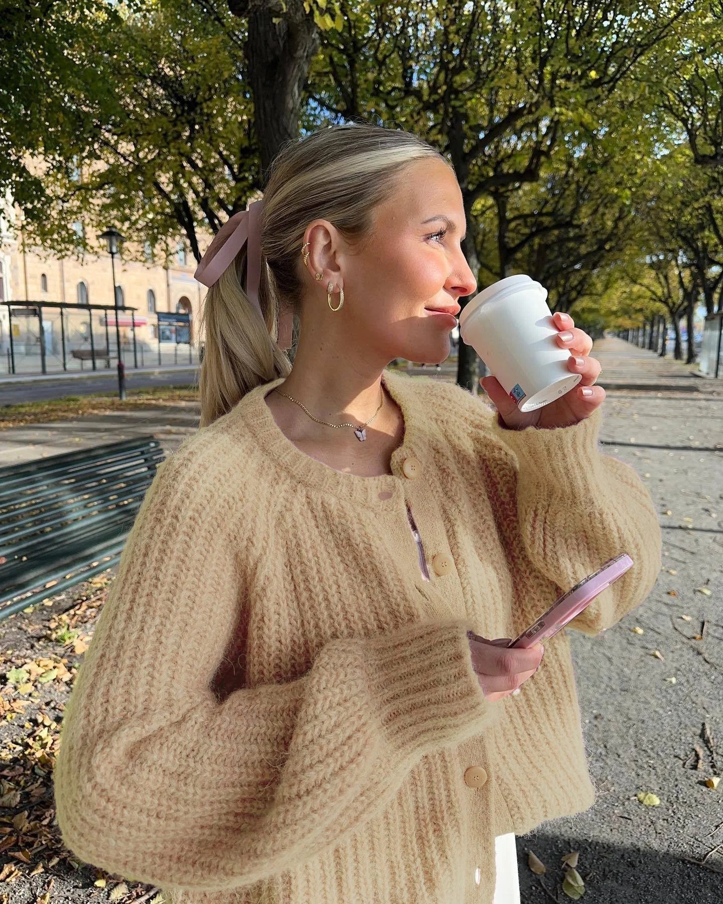 Women's cozy knit cardigan featuring a button front, made from soft fabric for warmth and comfort, ideal for layering.