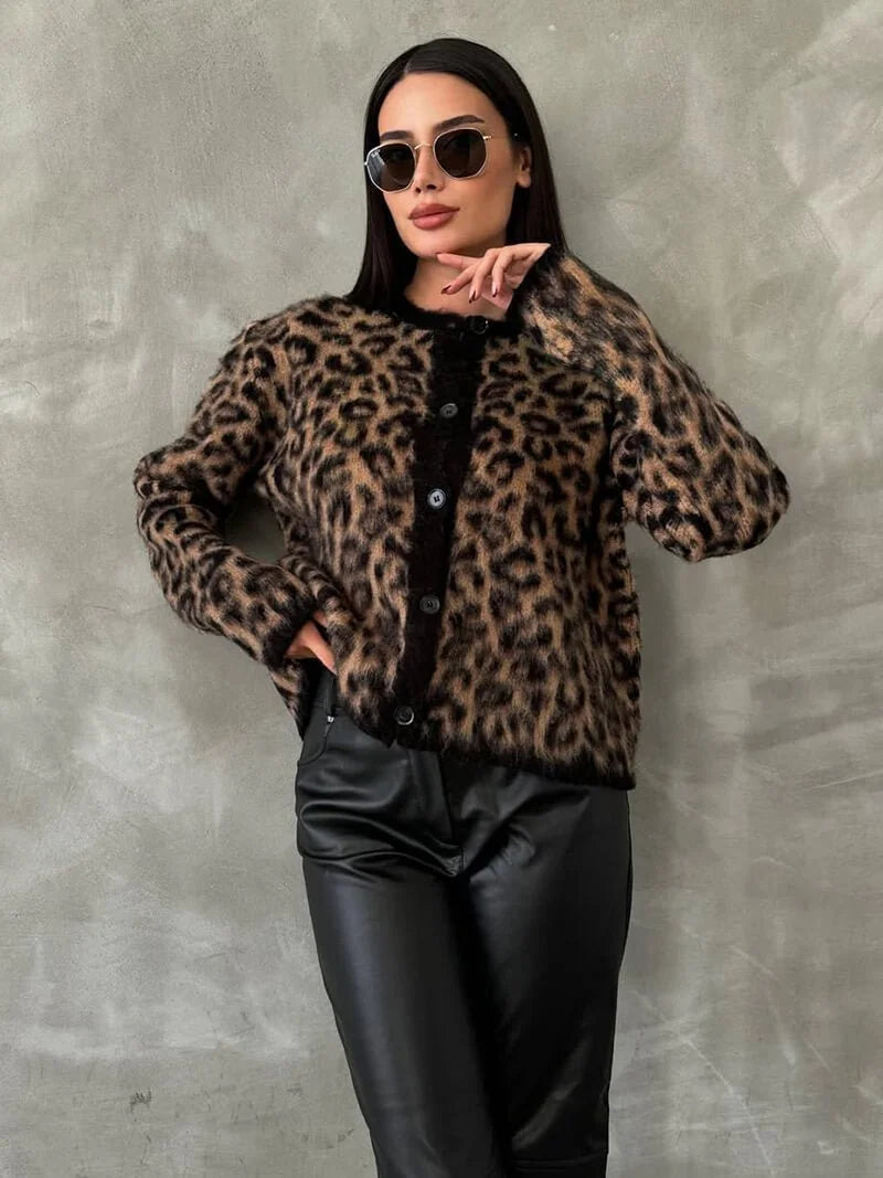 Women's cozy knitted cardigan with button front, featuring soft yarn, long sleeves, and ribbed cuffs for a comfortable fit.