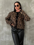 Women's cozy knitted cardigan with button front, featuring soft yarn, long sleeves, and ribbed cuffs for a comfortable fit.