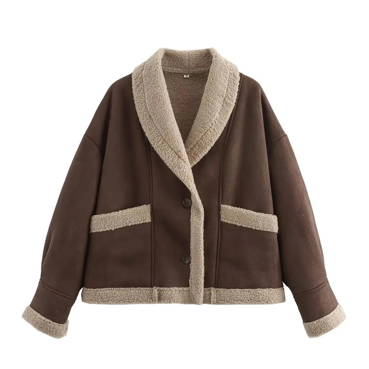 Women's oversized teddy coat made from soft fabric, featuring a wide collar and relaxed fit for comfort in chilly weather.