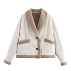 Women's oversized teddy coat featuring a wide collar, made from soft, plush fabric for warmth and comfort in winter.