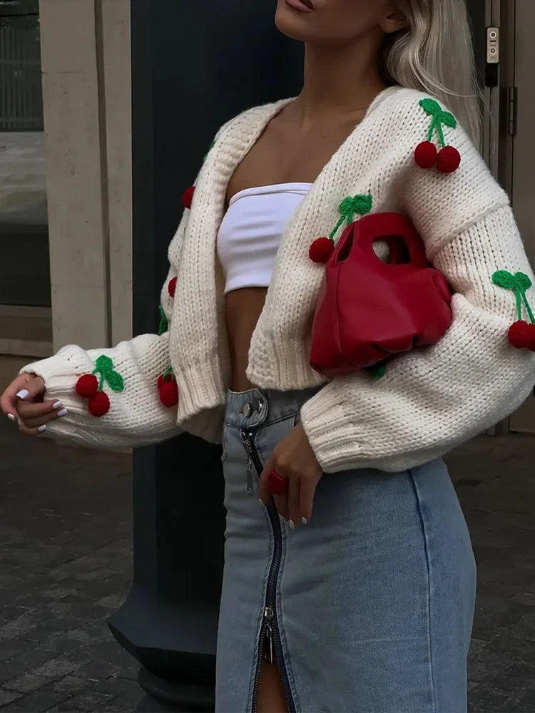 Cream cardigan for women featuring long sleeves and cherry embroidery, made from soft, comfortable fabric.