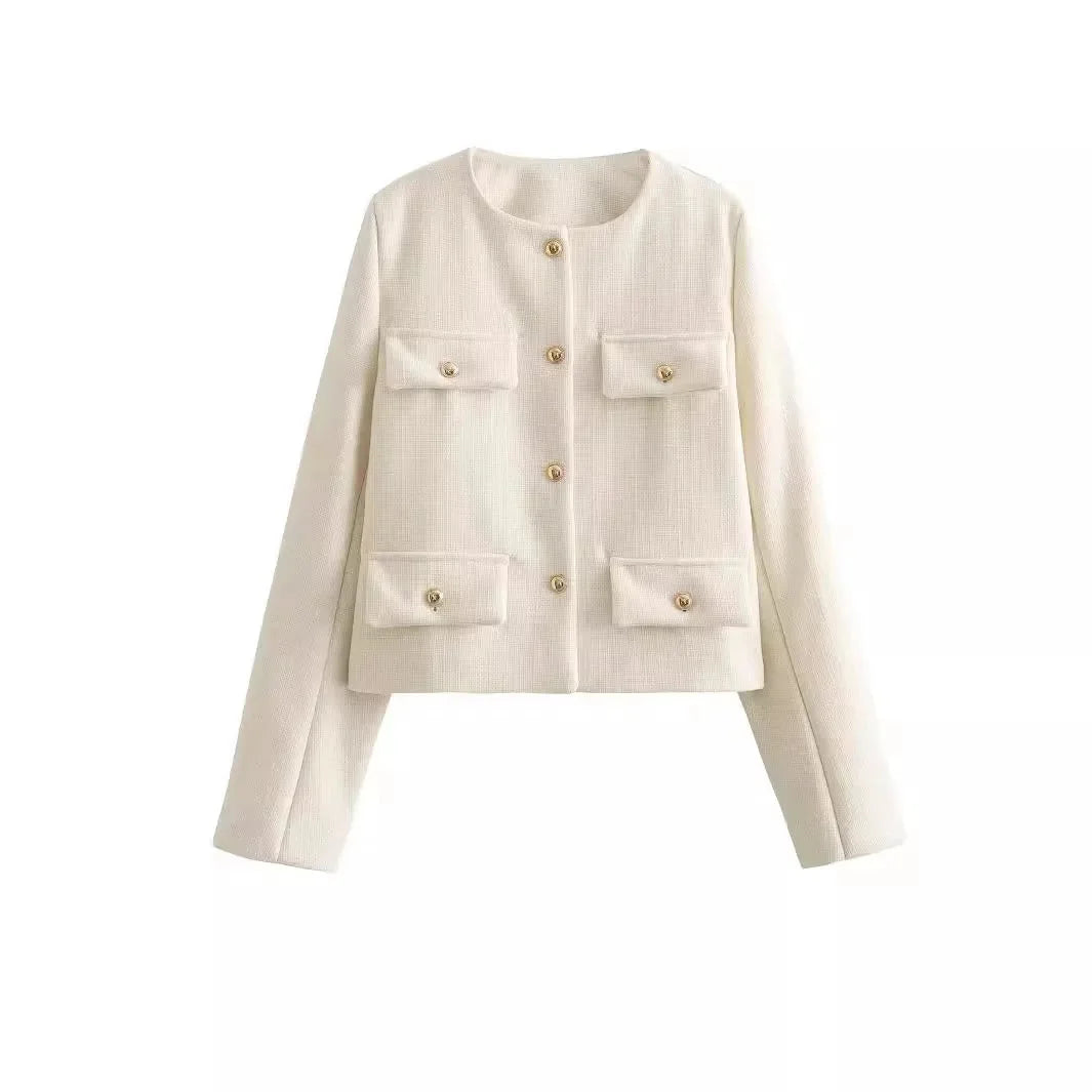 Women's cropped jacket in soft cotton, featuring a button front and practical pocket details for everyday wear.