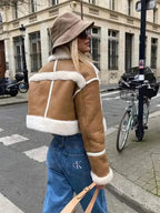 Tan cropped coat for women featuring white trim, made from lightweight fabric with a modern, stylish design.