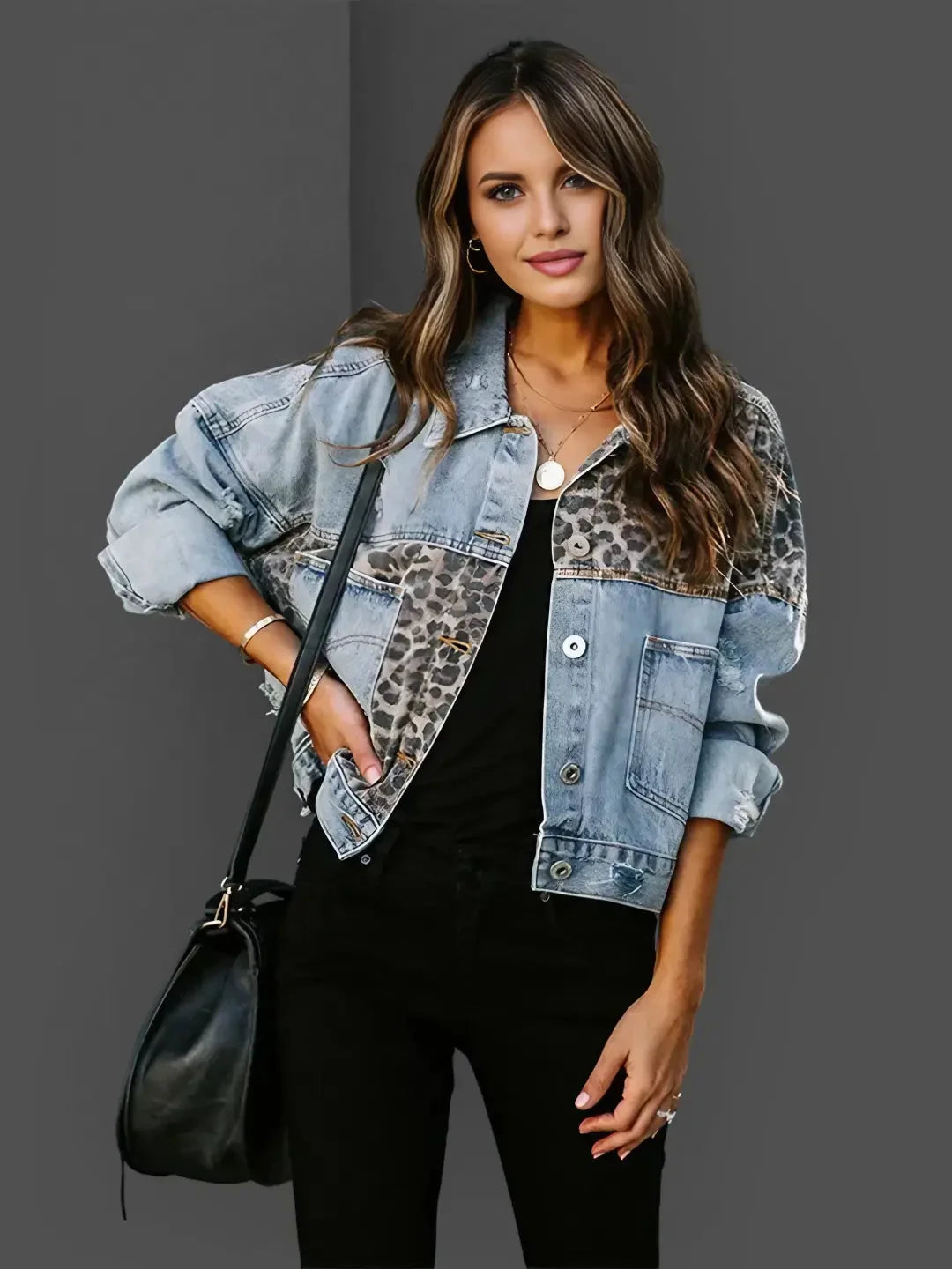 Women's denim jacket featuring leopard print accents, crafted from durable cotton denim for a stylish and unique look.