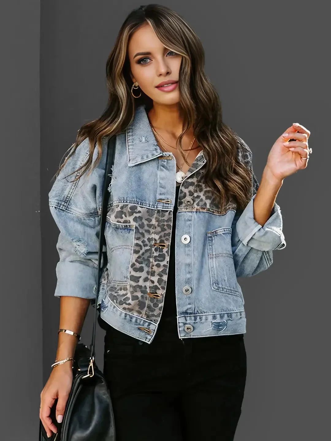Women's denim jacket featuring a leopard print accent, made from durable cotton with a trendy, casual design.