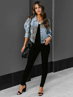 Women's denim jacket with leopard print accents; made of durable cotton with a stylish, edgy design perfect for casual wear.
