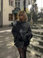 Women's winter coat with an elegant draped collar, crafted from warm wool blend for comfort and style during cold weather.