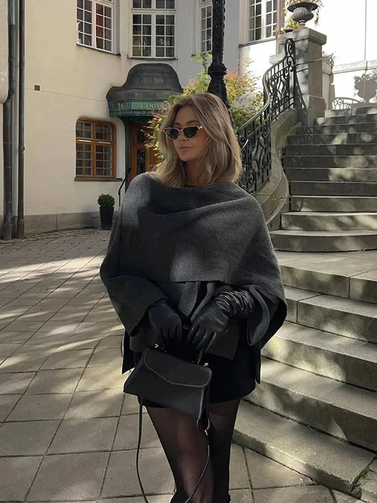 Women's winter coat with an elegant draped collar, crafted from warm wool blend for comfort and style during cold weather.