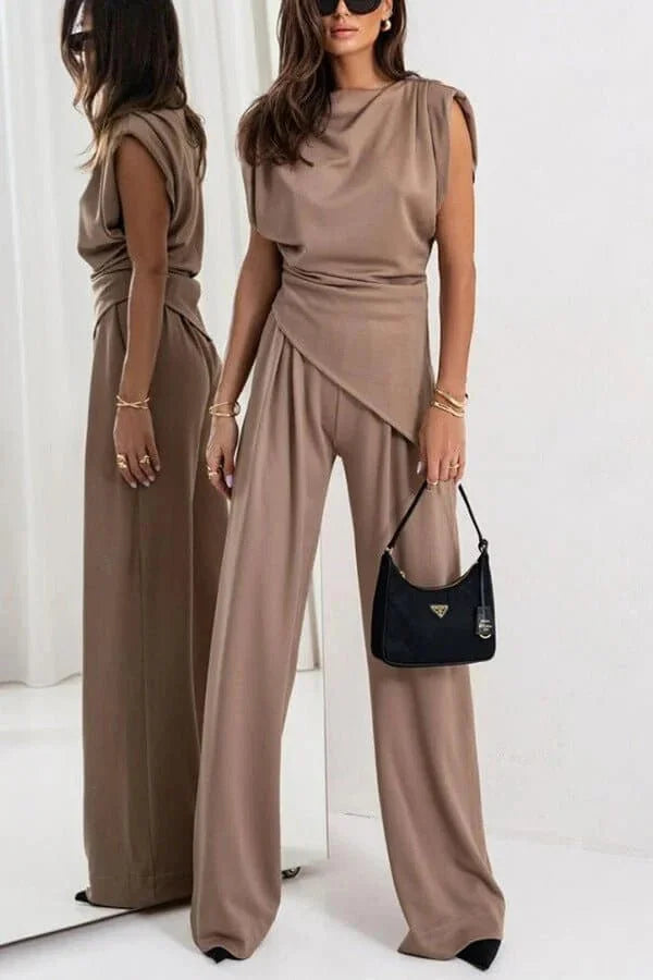 Women's two-piece set featuring draped design, wide pants, made from soft, breathable fabric for comfortable elegance.