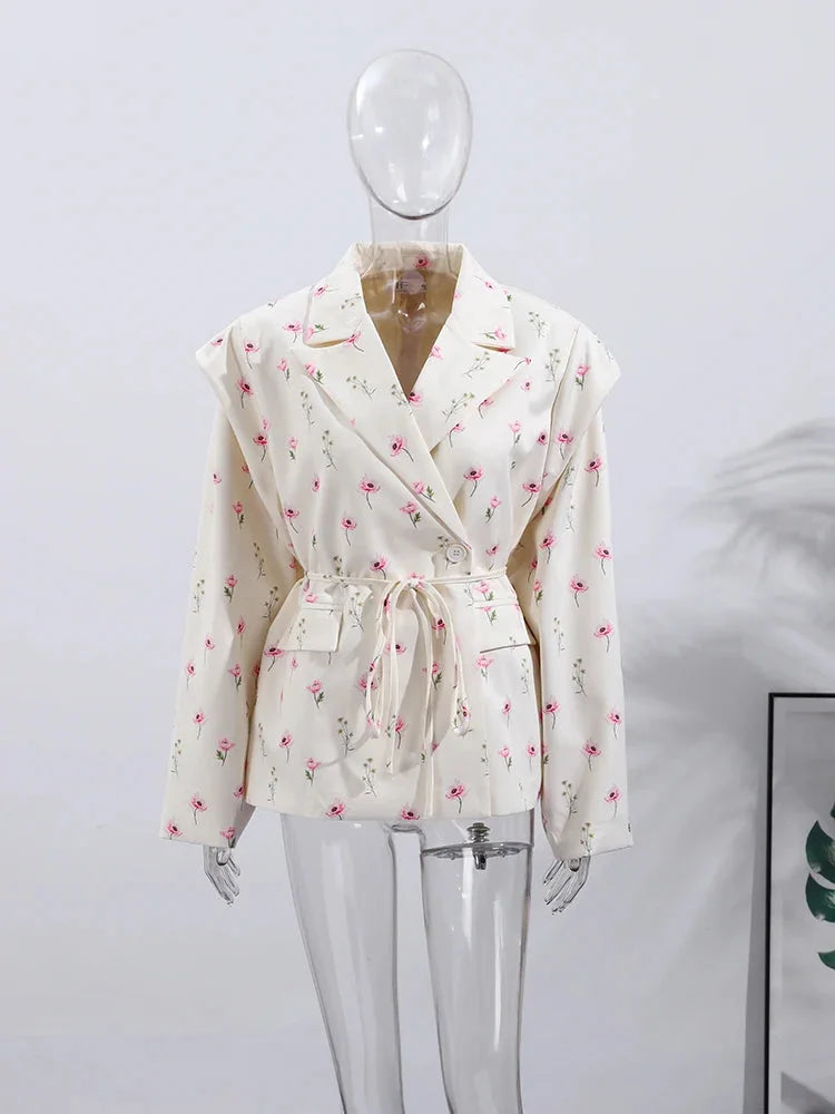 Women's lace-up blazer with shoulder pads, featuring a tailored fit and soft, breathable fabric for a polished look.