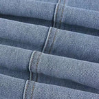 Women's flared jeans in denim with red star details and a flattering high-waisted design for a stylish casual look.