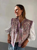 Women's floral boho vest made of lightweight fabric, featuring a vibrant ethnic print and a relaxed, open-front design.