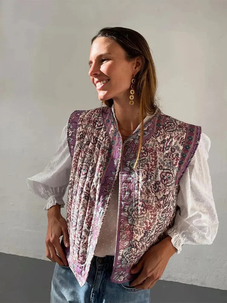 Women's floral boho vest made of lightweight fabric, featuring a vibrant ethnic print and a relaxed, open-front design.