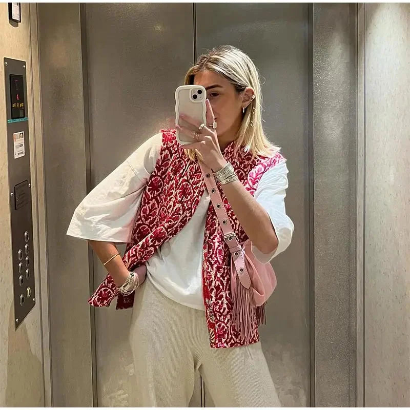 Women's floral boho vest featuring ethnic print, lightweight fabric, sleeveless design, and a relaxed fit for casual wear.