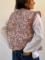Women's floral boho vest featuring an ethnic print, crafted from lightweight fabric for comfortable layering in warm weather.