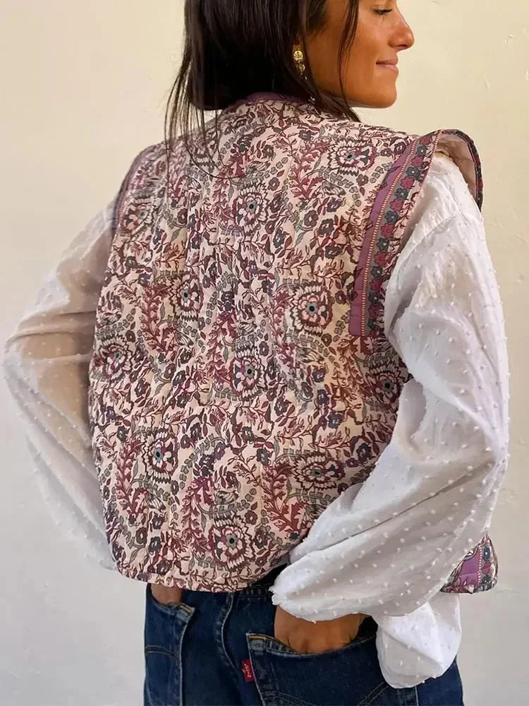 Women's floral boho vest featuring an ethnic print, crafted from lightweight fabric for comfortable layering in warm weather.