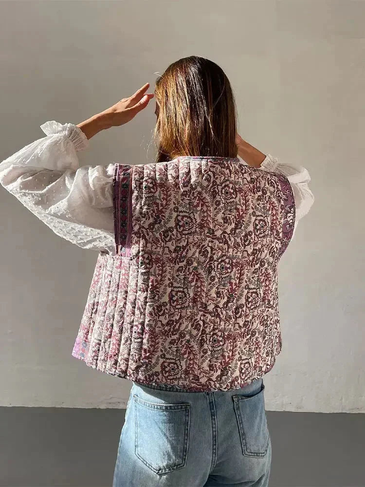 Women's Floral Boho Vest made of lightweight fabric, featuring vibrant ethnic prints and a relaxed fit for casual layering.