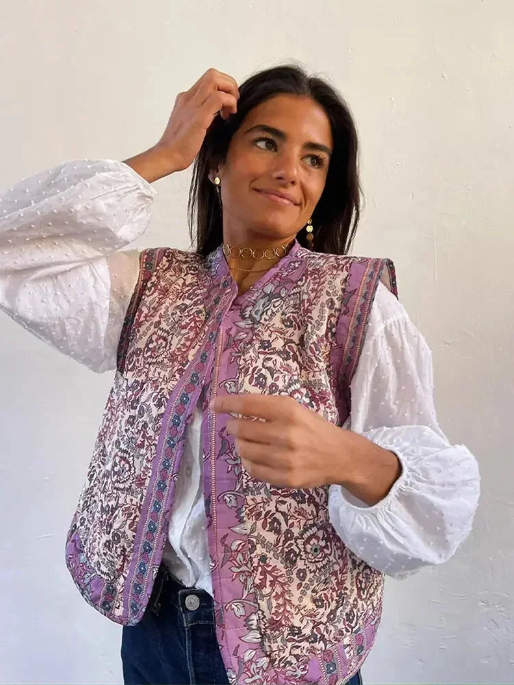 Women's floral boho vest made of lightweight fabric featuring an ethnic print and open-front design, perfect for layering.