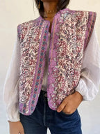 Women's floral boho vest featuring ethnic print in lightweight cotton, with an open-front design and flowy silhouette.