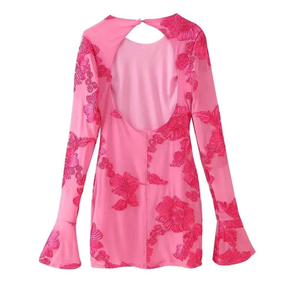 Women's floral mini dress made of lightweight fabric, featuring long flared sleeves and a playful pattern for a fresh spring…