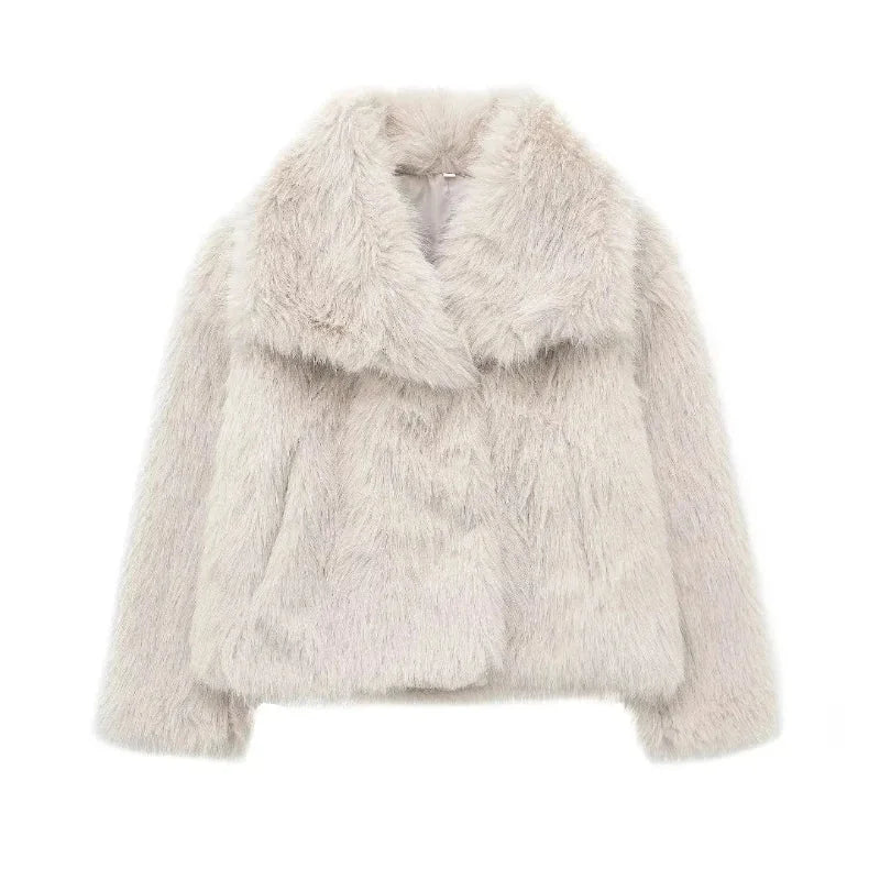 Women's fluffy jacket featuring an oversized collar, made from soft polyester for warmth and comfort in cool weather.