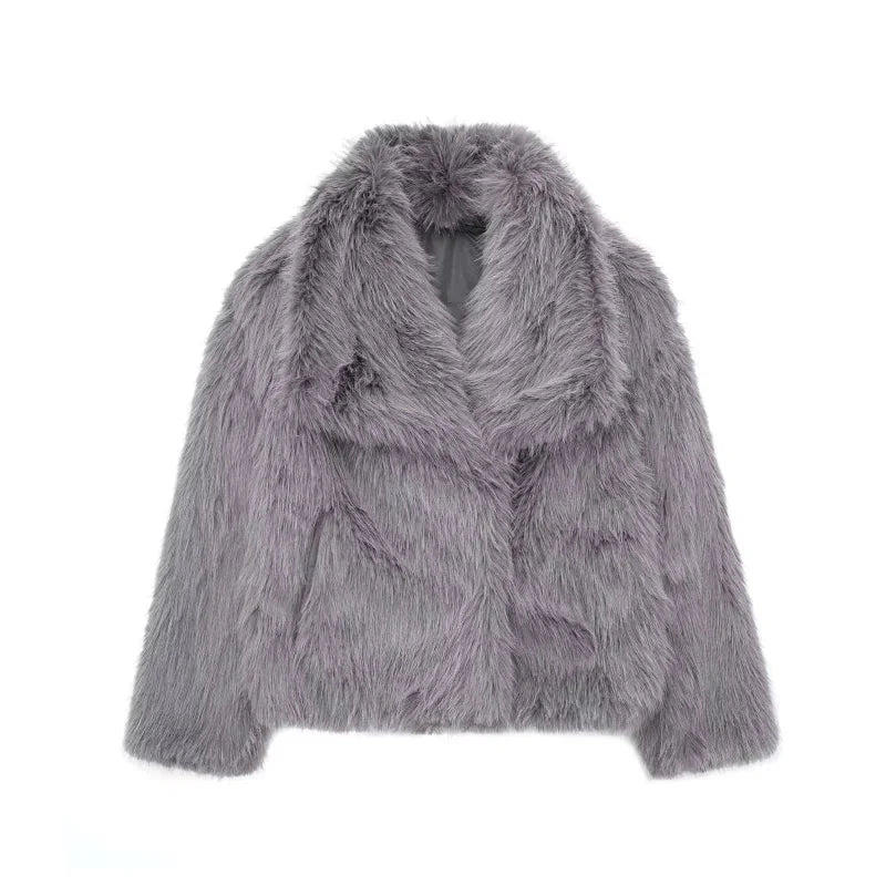 Women's fluffy jacket featuring an oversized collar, made from soft, cozy fabric for warmth and comfort in chilly weather.