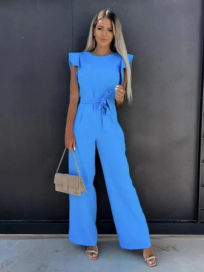 Women’s wide-leg jumpsuit with flutter sleeves and bow tie, made from lightweight fabric for comfort and breathability.