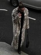 Women's full-length leopard print coat with collar, made of soft fabric, featuring a classic silhouette and stylish design.