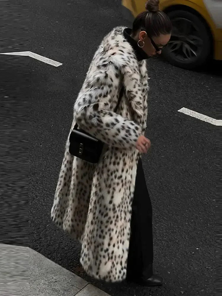 Women's full-length leopard print coat with collar, made from soft fabric featuring a stylish, bold animal pattern.