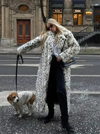 Women's full-length leopard print coat featuring a classic collar, made from soft, warm fabric for a stylish look.