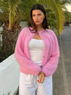 Cozy women's fuzzy button-up cardigan in a relaxed fit, featuring soft fabric and classic button details for everyday wear.
