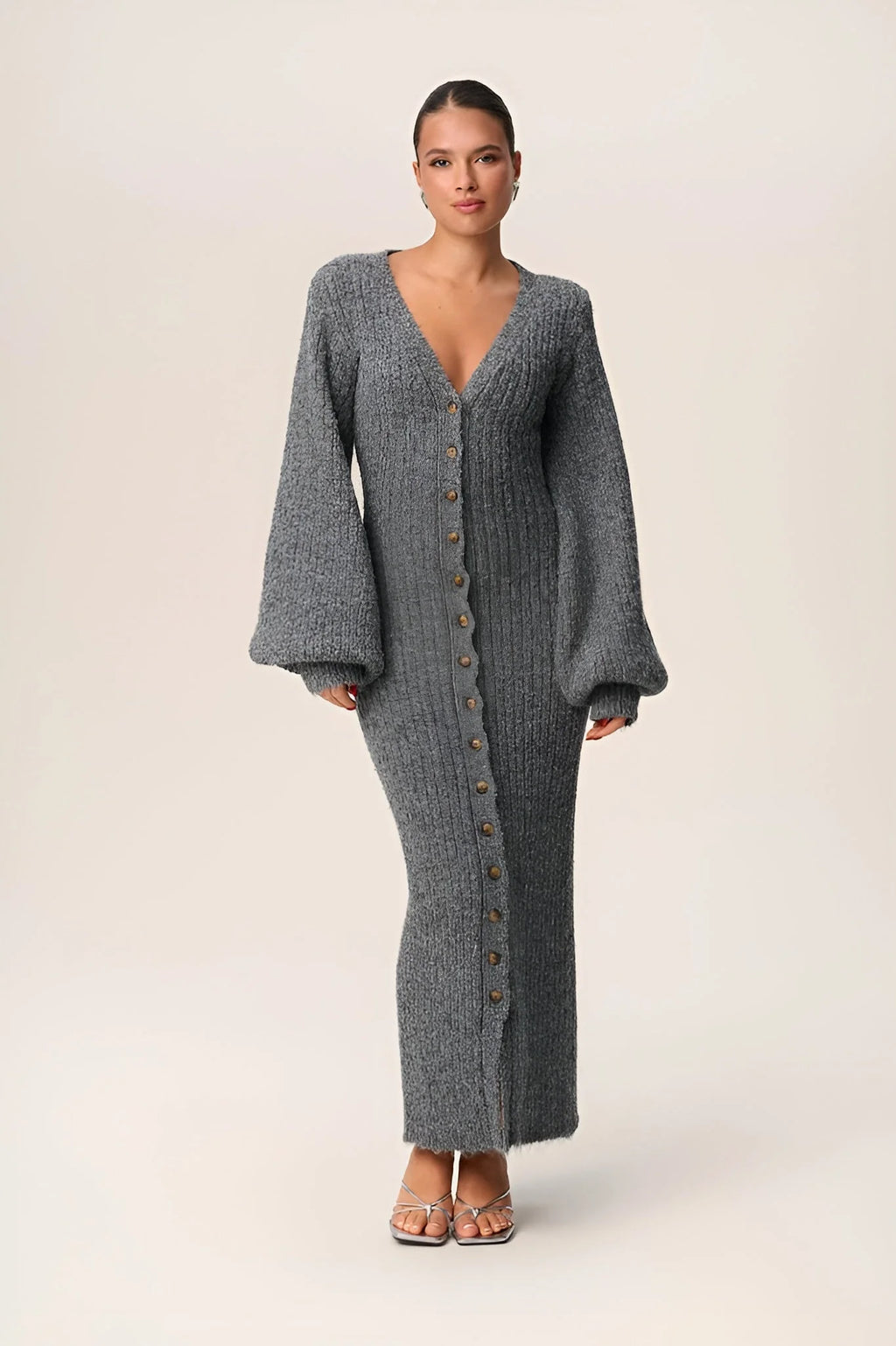 Women's gray maxi dress featuring a button front, long sleeves, and soft fabric, perfect for casual or semi-formal occasions.
