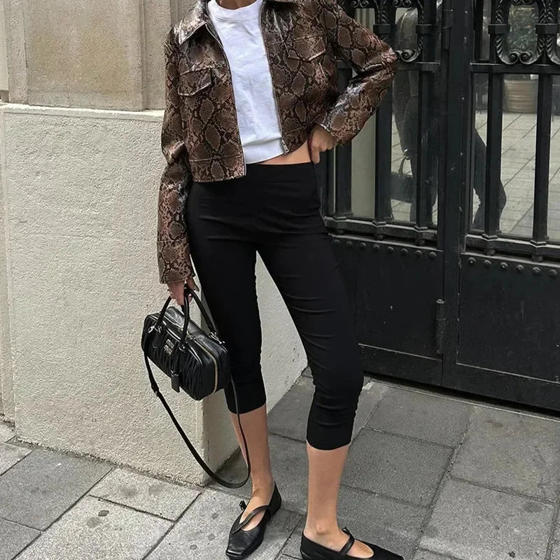 Black high waist capri workout leggings for women made from stretchy, breathable fabric with a comfortable fit and stylish…