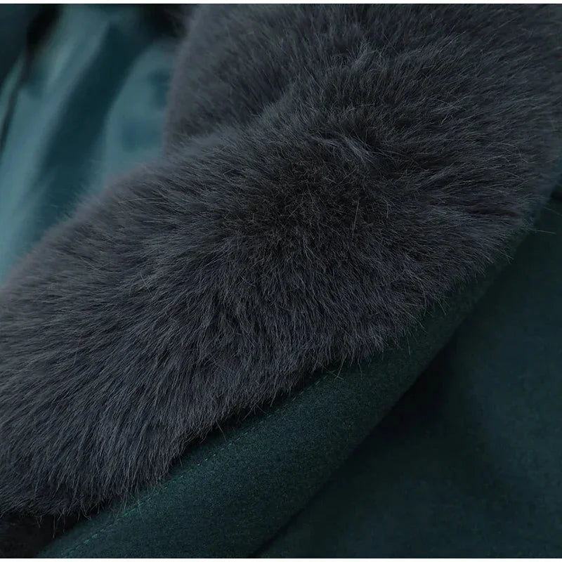 Charcoal gray women's jacket with a soft faux fur collar, featuring a classic design and zip-up closure.