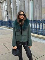 Charcoal gray women's jacket featuring a soft faux fur collar and a fitted design for warmth and style.