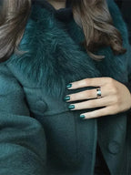 Charcoal gray women's jacket featuring a stylish faux fur collar, made from a soft, durable fabric for warmth and comfort.