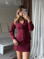 Women's knit skirt set featuring a long sleeve top, made from soft fabric with a comfortable fit and versatile design.