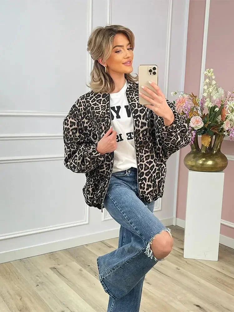 Women's leopard print bomber jacket made of lightweight fabric with ribbed cuffs and a zippered front for a casual look.