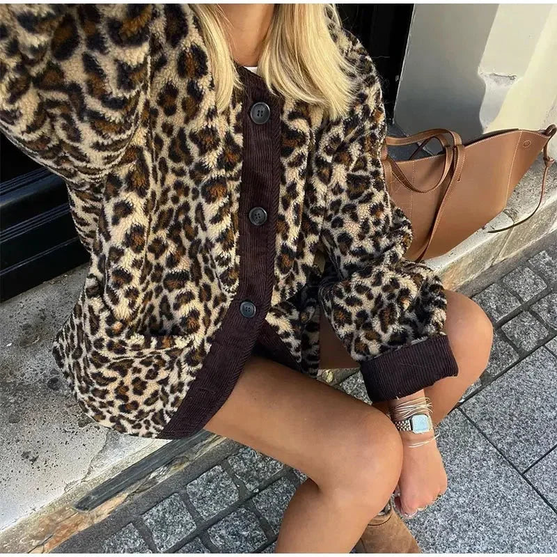Women's leopard print cardigan featuring a button-up front, made of soft fabric for comfort in casual settings.