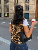 Women's leopard print casual vest made from soft fabric, featuring a relaxed fit and stylish sleeveless design.