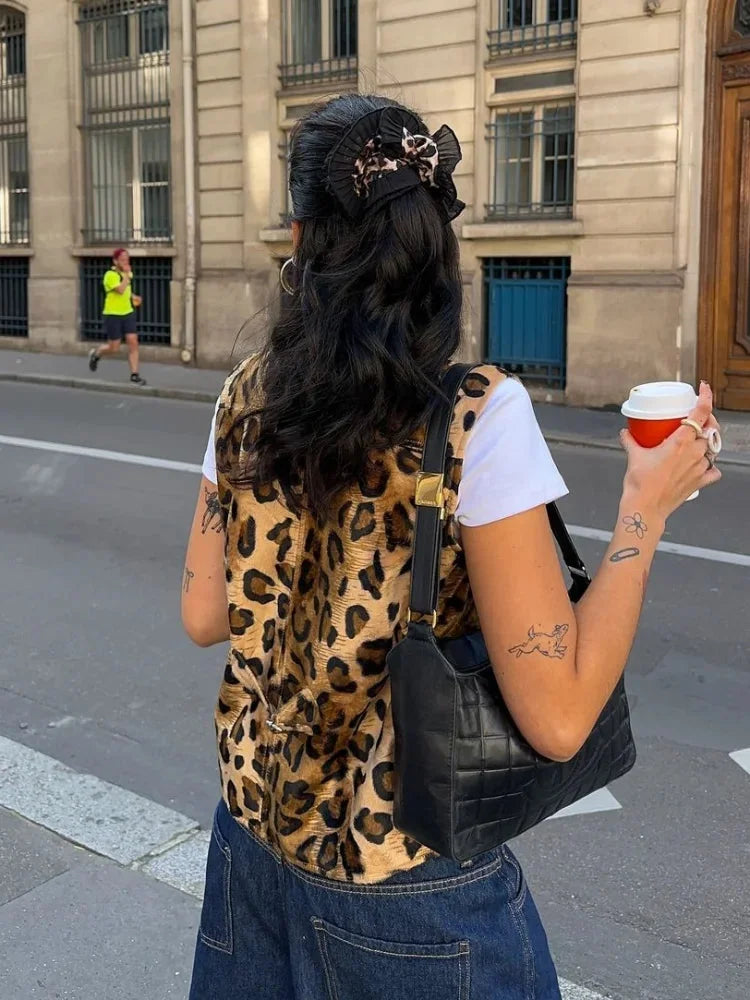 Women's leopard print casual vest made from soft fabric, featuring a relaxed fit and stylish sleeveless design.