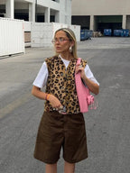 Leopard print casual vest for women, made from soft fabric with a relaxed fit and stylish open front design.