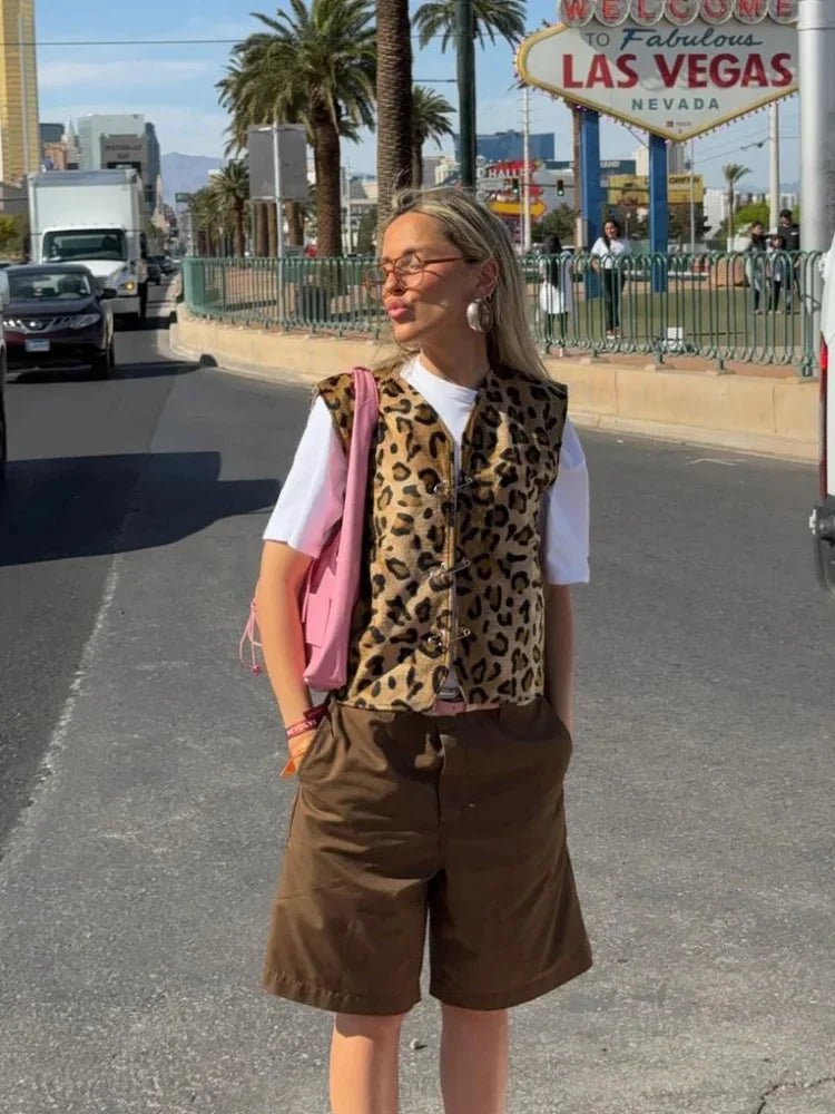 Women's leopard print casual vest made from lightweight fabric, featuring a relaxed fit and open front design.