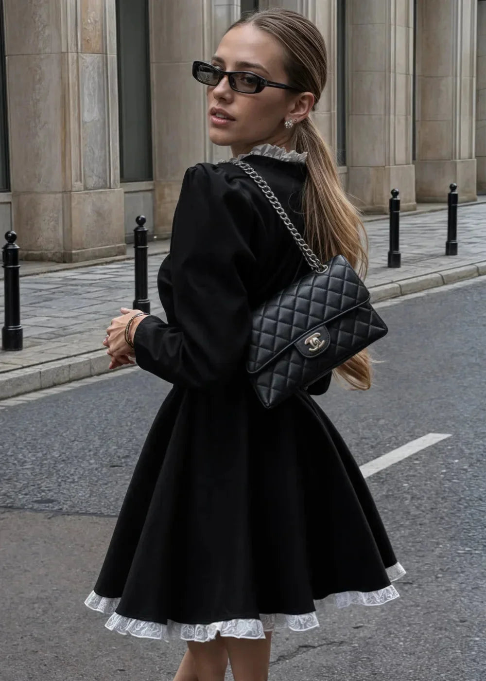 Women's long-sleeve mini dress featuring a ruffled collar, designed in soft fabric for comfort and casual elegance.