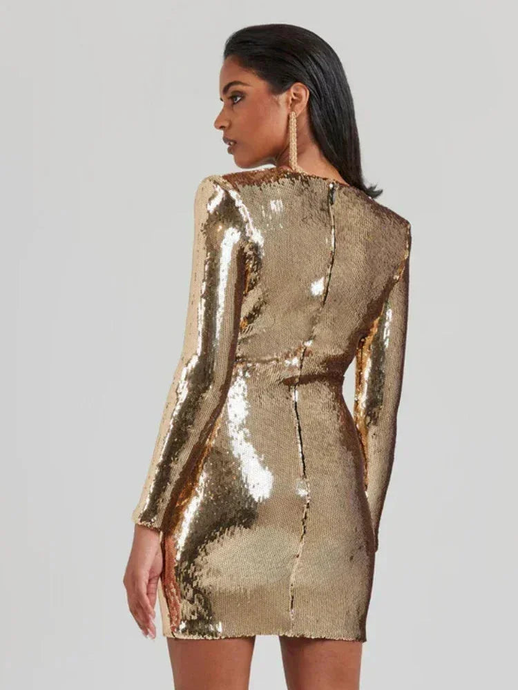Women's long-sleeve mini dress in gold with sequins, featuring a fitted silhouette and soft fabric for a stylish party look.
