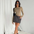 Women's long sleeve slim fit pullover top made of soft cotton blend, featuring a classic crew neck and simple silhouette.