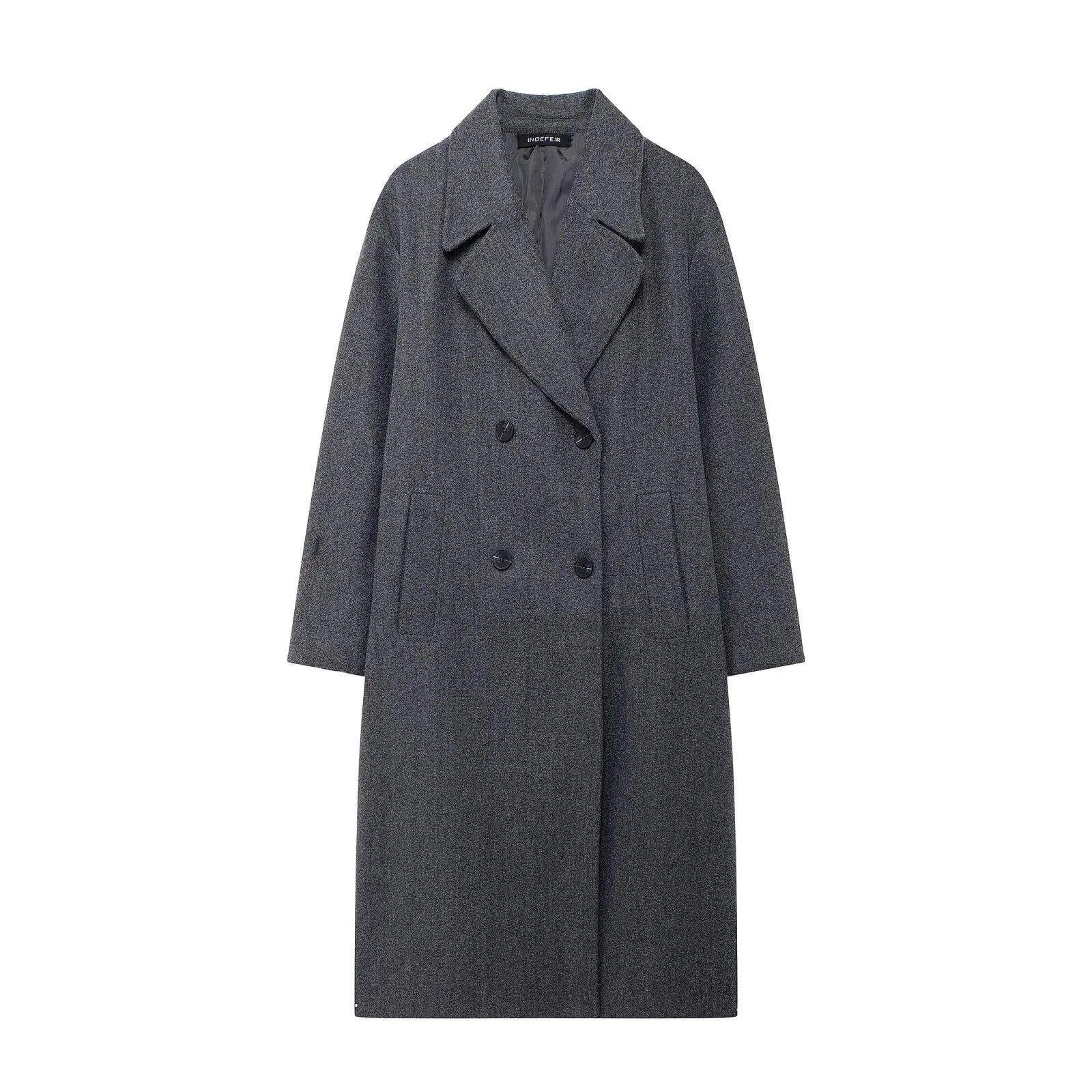 Women's long structured coat in a relaxed fit, made from durable fabric with oversized sleeves and a tailored silhouette.